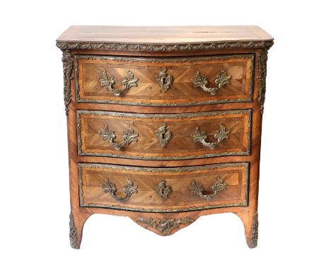 A Louis XV Rosewood, Kingwood, Boxwood and Ebony-Strung Serpentine-Shape Commode, late 18th century, the quarter-veneered top