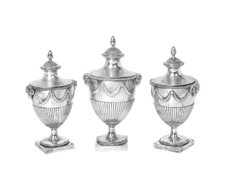 A Set of Three George III Silver Condiment-Vases,  by Robert Makepeace and Richard Carter, London, 1777  each vase-shaped and