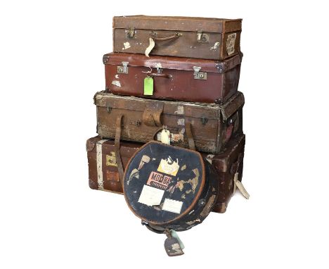 An Early 20th Century Trunk, labelled Pukka, with brown leather close-nailed corners and carrying handles92cm by 52cm by 34cm