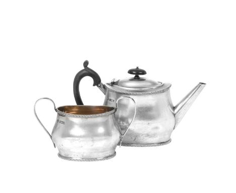 An Edward VII Silver Teapot and Sugar-Bowl,  by William Hutton and Sons Ltd., London, 1908 and Sheffield, 1909 each oval and 