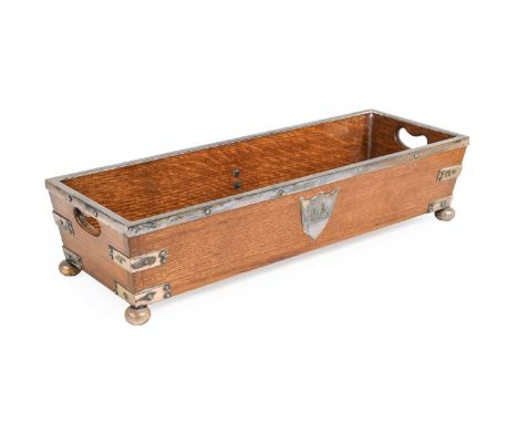 A Victorian White-Metal-Mounted Oak Trough, of rectangular form, applied with crests in shield-shaped panels, on bun feet48cm
