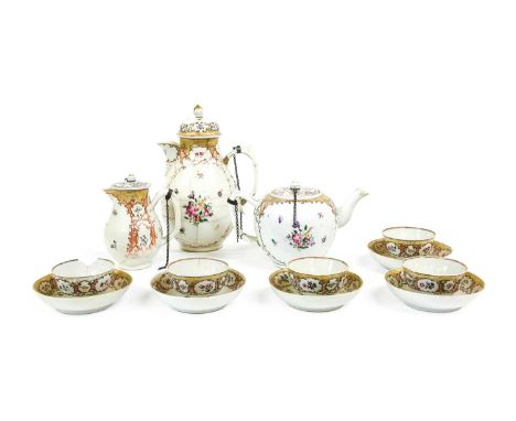 A Chinese Porcelain Tea and Coffee Service, Qianlong, painted in famille rose enamels with sprays of flowers within gilt scro