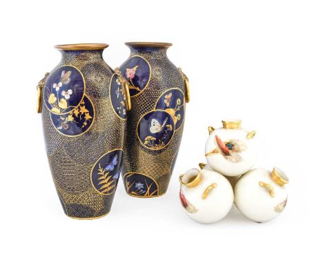 A Pair of Royal Worcester Porcelain Japanesque Baluster Vases, late 19th century, with loop handles, painted and gilt with in