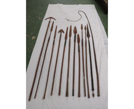Eleven tribal type spears, the longest 158cm, one example being double-ended with metal shaft covered in decorative wire bind