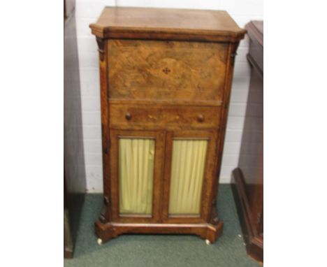 A mid Victorian burr walnut veneered secretaire music cabinet with boxwood stringing and inlay, the top section with fall fro