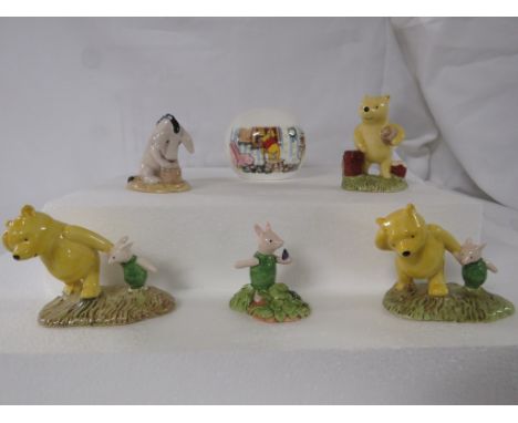 Four unboxed Royal Doulton Winnie the Pooh collection figures - 'Piglet picking the violets' WP13, 'Eeyore's birthday' WP14, 