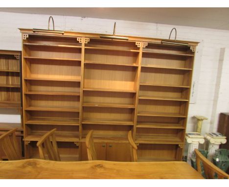 A 21st century bespoke study bookcase made from oak felled near Honiton in 2000, designed by John McDowell and constructed in