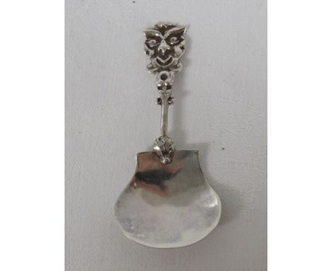 A Victorian silver caddy spoon with a mask head stem, the plain bowl bears the marks for Birmingham, 1891, maker's stamp John