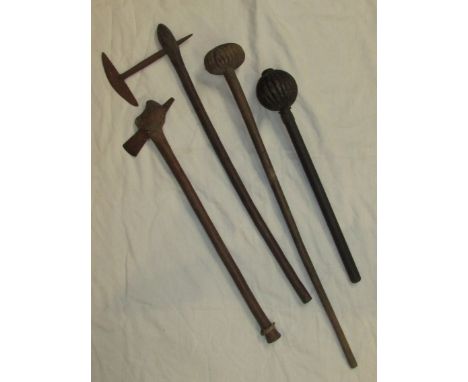 A knobkerrie or knobkierie with wooden shaft and hollow reeded metal ball head, length 46cm, another example with wooden shaf