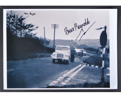 The Great Train Robbery - Bruce Reynolds (1931-2013) &amp; Ronnie Biggs (1929-2013) - autographed A4 photograph showing Polic