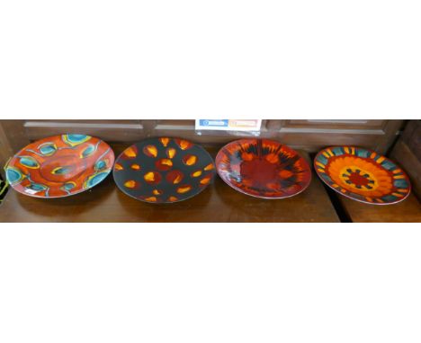 4 large Poole pottery chargers - one with crack