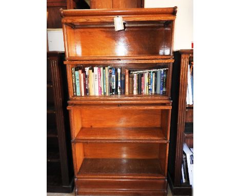 A four section oak Globe Wernicke bookcase height 130cm