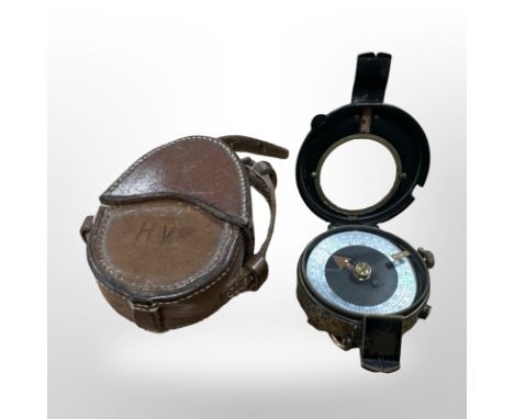 A WWI marching compass by T Cooke & Sons, No.41282, dated 1916, in leather pouch