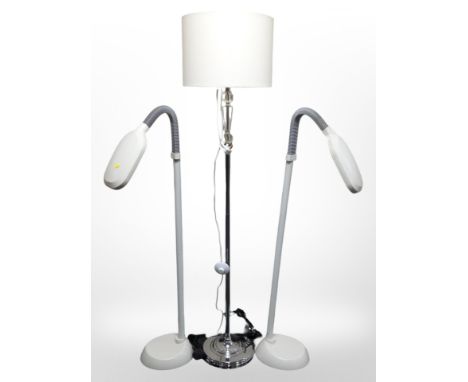 A contemporary standard lamp and a further pair of lamps.