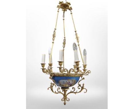 A 20th-century continental gilt metal and porcelain pendant light fitting, length 93cm.