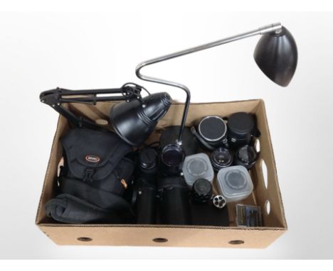 A group of camera lenses including Osawa, Minolta, etc., together with a modern angle-poise lamp, and a further table lamp (c