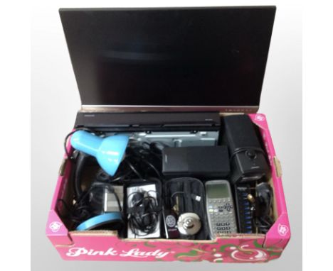 A group of electricals including Bose speakers, Asus monitor, angle-poise lamp, Panasonic DVD player, etc. (continental plugs