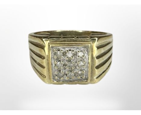A gent's 9ct gold diamond-set ring, the stated total diamond weight 0.12 carat, size P CONDITION REPORT: 4g