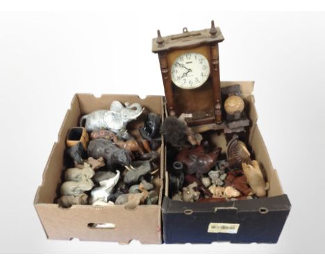 A group of elephant ornaments including carved wooden examples, pair of globe bookends, wall clock, etc. (2 boxes)
