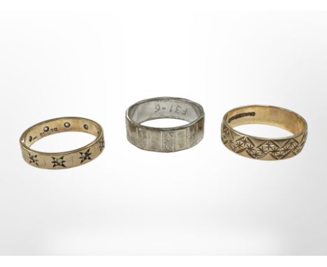 Three 9ct gold band rings CONDITION REPORT: 8.6g gross