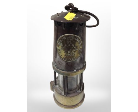 A 19th-century Eccles Type SL miner's safety lamp, together with a further smaller brass example.