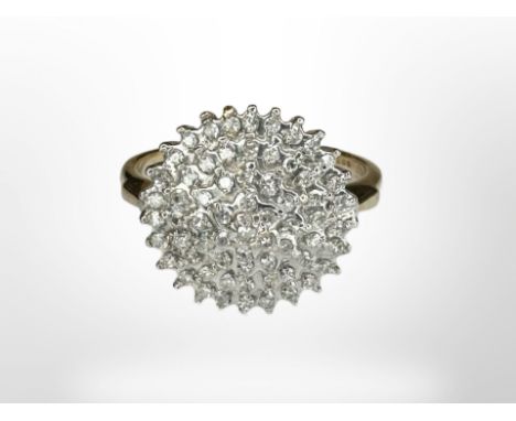 A 9ct gold diamond cluster ring, size O CONDITION REPORT: 3.7g