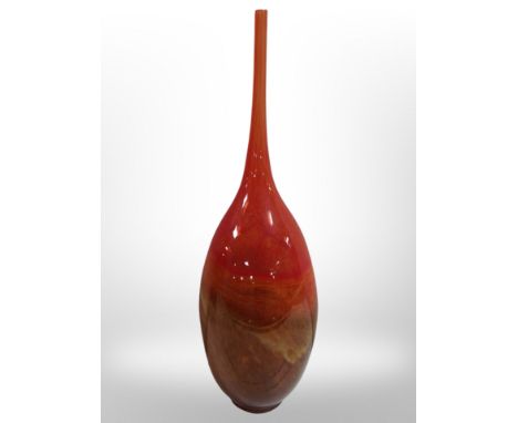 A tall mouth-blown art glass vase with flecked orange and brown decoration, height 46cm.