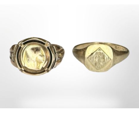 A 9ct gold signet ring and a further French yellow metal ring CONDITION REPORT: 3.8g