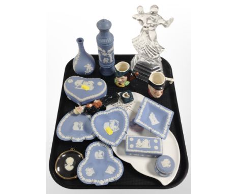 A group of Wedgwood blue and white Jasperware shallow dishes and trinket boxes, miniature character jugs, cameo, etc.