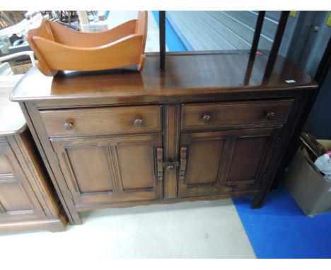 A modern Ercol mid dark side dresser base