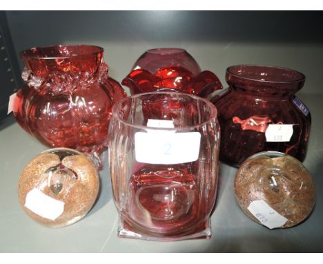A selection of colour glass ware including ruby red and pink and named Dartington