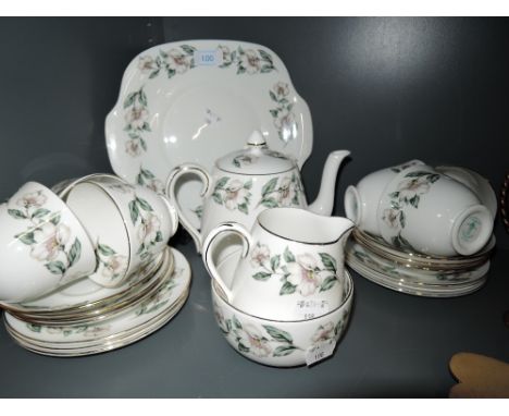 A part tea service by Crown Staffordshire with floral print