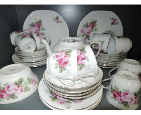 A part tea service by Victoria China with floral print