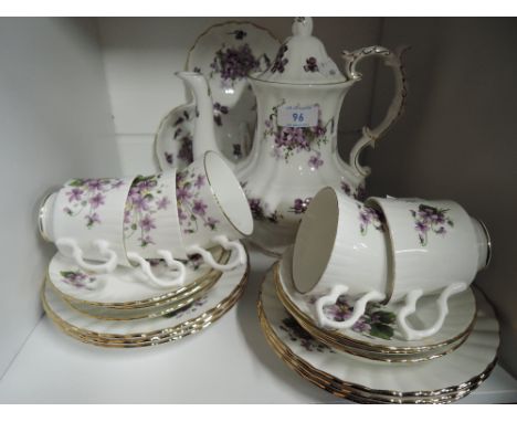 A part tea service by Royal Stafford with gilt edgework