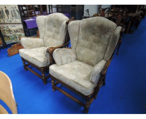 A modern Ercol colonial style armchairs 