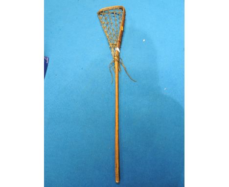 An early La Cross racket or stick