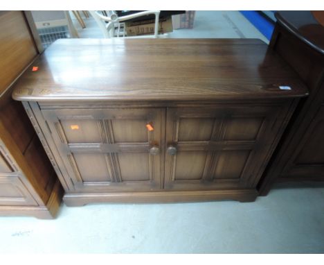 A modern Ercol mid dark side cabinet