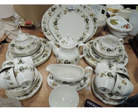 A part tea and dinner service by Royal Doulton in the Larchmont pattern