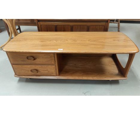 An Ercol light elm 2 height coffee table fitted 2 short drawers, 124 cm 