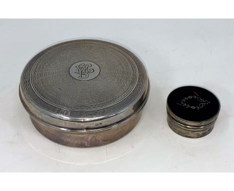 A hallmarked silver circular box, engine turned, with plastic lining, Birmingham 1948; a hallmarked silver circular patch box