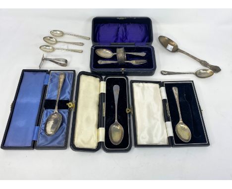 A hallmarked silver christening spoon and fork, cased; other hallmarked silver cased and loose teaspoons, etc., various dates