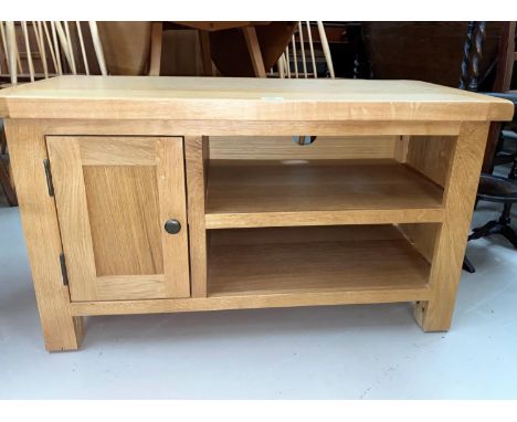 A modern light oak TV stand/coffee table 