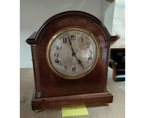 A mahogany cased mantel clock