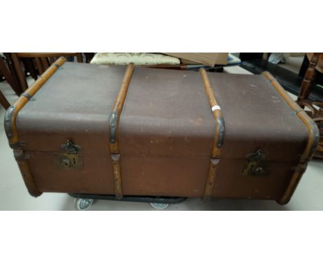 A wood bound fibre cabin trunk. 