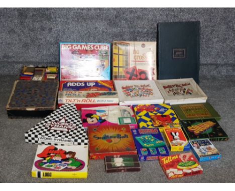 A box containing vintage and newer boxed games such as tilt n roll ludo scatter ball solitaire etc