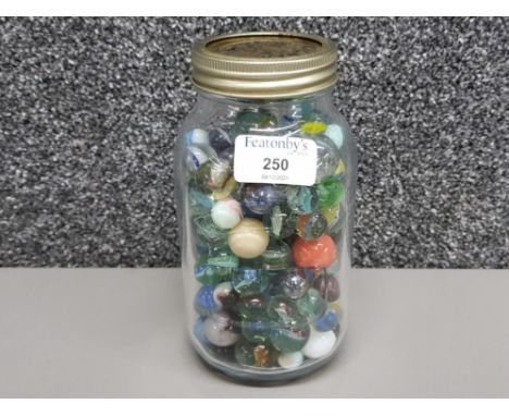 Vintage marbles of various sizes in a kilner jar
