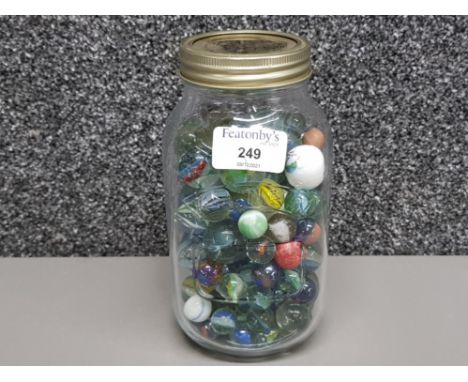 Vintage marbles of various sizes in a kilner jar