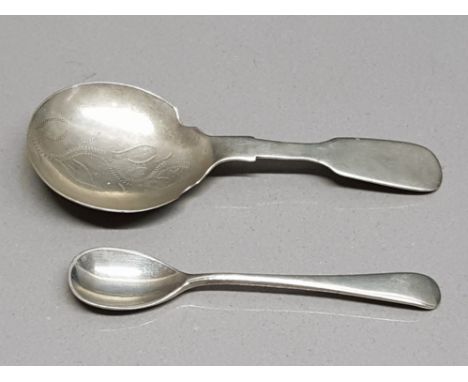 A silver caddy spoon (hallmarks rubbed) and an african silver spoon