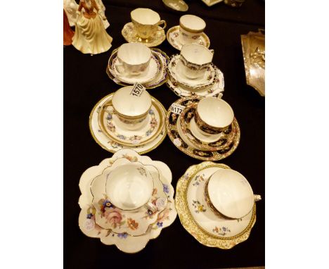 Six trios including  Aynsley & Paragon and a pair of cups and saucers