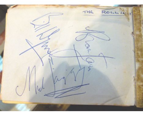 Vintage autograph book with Rolling Stones signatures including Brian Jones